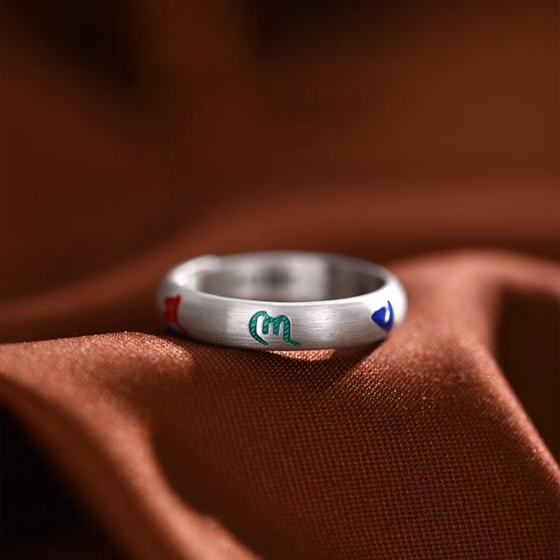 Sacred Om Ring - Chiseled Light, Enameled Prayer